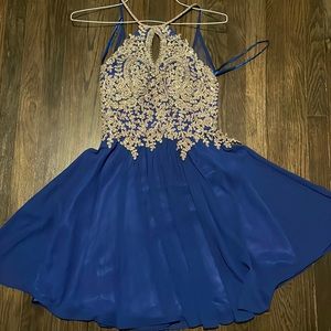 This is a beautiful blue dress custom made with beautiful rhinestones